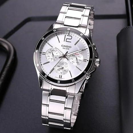 Casio MTP-1374D · Acero plateado / Cara blanca